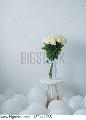 Beautiful Bouquet Of White Blooming Roses In Glass Vase On The White Background. White Flowers With 