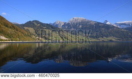 Small Village Innerthal And Mountains In Autumn.