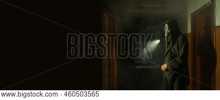 Man In Gas Mask Lighting A Flashlight Says Stop The Destruction In The World. Post Apocalypse. Banne