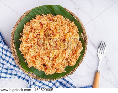 Sweet And Sour Crispy Noodles Or Mee Krob In The Thai Language On A Dish With Cutlery And Cloth Plac
