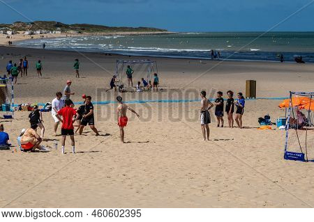 Calais, France - 26 June 2022: Young People Playing Handball On The Beach Of Calais During Summertim