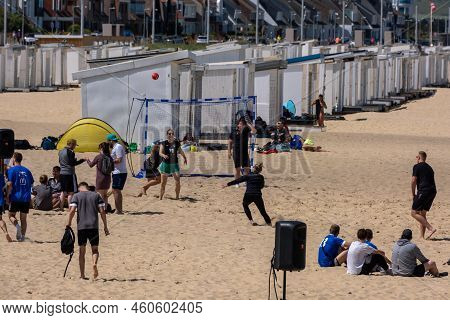 Calais, France - 26 June 2022: Young People Playing Handball On The Beach Of Calais During Summertim