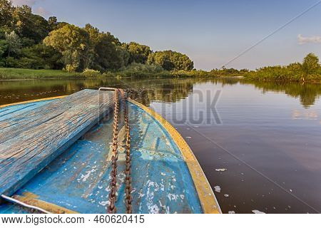 Travel Destinations. The Pripyat River With Motorboat Passing Along The Shore.horizontal Image Compo