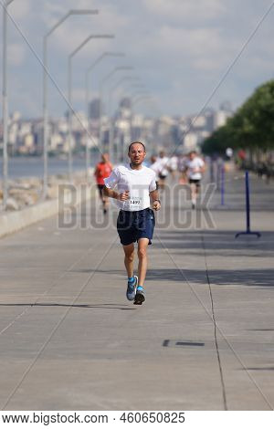 Istanbul, Turkiye - June 18, 2022: People Running In Colors During Color Run Maltepe 7k Run