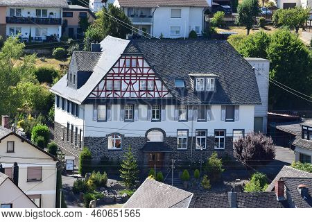Ulmen, Germany - 08 09 2022: Historic School Building With Stone And Half-timbered Upper Part