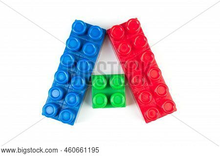 Educational Toy, Constructor For Children Isolated On White Background. Top View With Copy Space.