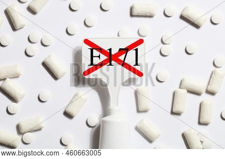 Titanium Dioxide, E171, Dangerous Additive Concept. Gum, Pills, Toothpaste Or Cream And Sign With E1