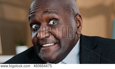 Close Up Front View Male Wrinkled Elderly Face Emotional Funny Frightened Puzzled African Business M