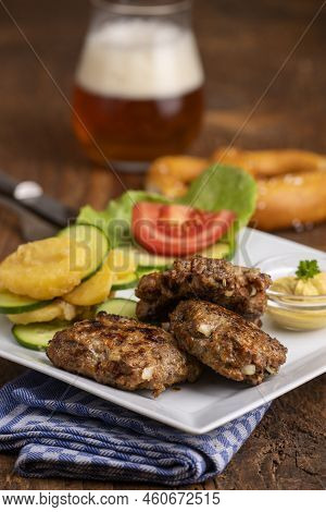 Closeup Of Bavarian Minced Meat Fleischpflanzerl With Salad