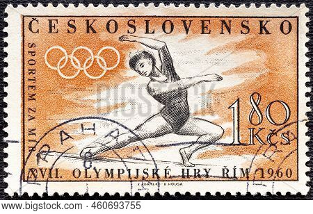 Czechoslovakia -circa 1960: A Stamp Printed In Czechoslovakia Shows Gymnast On Balance Beam, Olympic