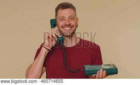 Hey You, Call Me Back. Handsome Young Man In Red T-shirt Talking On Wired Vintage Telephone Of 80s, 
