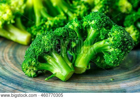Macro Photo Green Fresh Vegetable Broccoli. Fresh Green Broccoli On A Black Stone Table.broccoli Veg