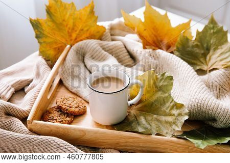 Autumn Home Still Life: A Cup Of Coffee, A Warm Sweater And Yellow Leaves. Seasonal Breakfast, Morni