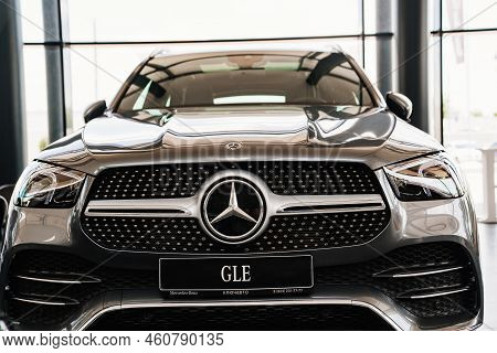 A Grey Mercedes Gls Car In The Parking Of A Car Dealership