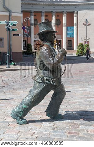 Tallinn, Estonia - June 19, 2022: Lucky Chimney Sweeper Sculpture.