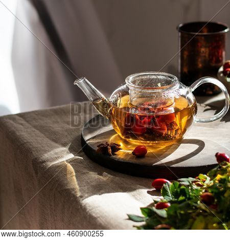 Rosehip Hearbal Tea On Wooden Board. Vertical