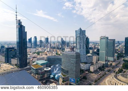 7.22.2022 Warsaw, Poland. Quickly Developing European City Filled With Neomodern Skyscrapers Reachin
