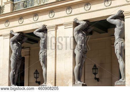 St.petersburg, Russia - August 11th,2022: Figures Of Atlanteans (five-meter Titans) Made Of Gray Ser