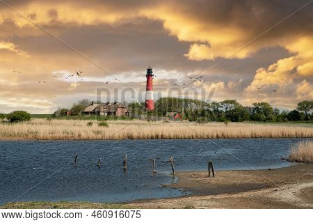 Panoramic Image Of Pellworm Lighthouse Against Sunrise, North Frisia, Germany