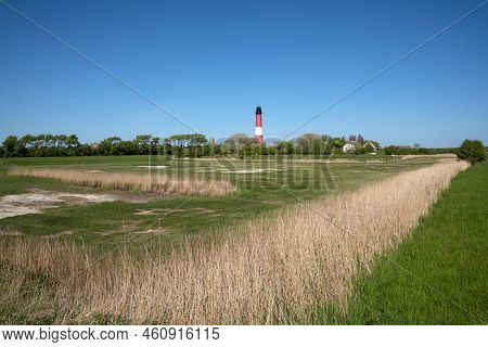 Panoramic Image Of Pellworm Lighthouse Against Sunrise, North Frisia, Germany