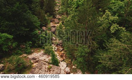 Aerial Drone Shot Of Prionia River Between The Bushes And Trees. Natural Travel Destination. . High 