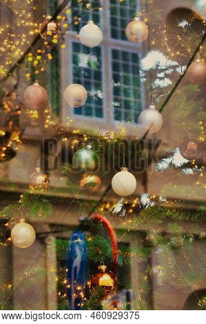 Den Haag, Netherlands - January 03 2022: A Crown, A Window And Festive Christmas Decorations Can Be 