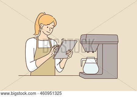 Happy Young Female Waitress In Coffeeshop Taking Order On Pad. Smiling Woman Barista Work On Tablet 