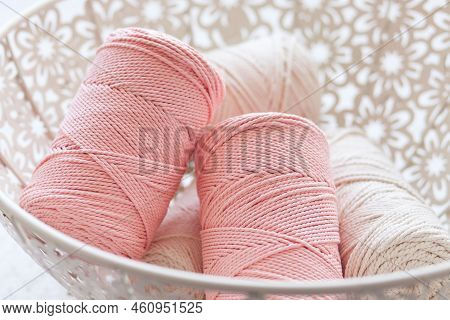 Handmade Macrame Braiding And Cotton Threads In Basket On White Background. Cotton Macrame Cords And