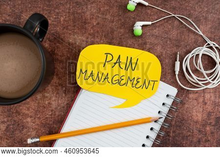 Hand Writing Sign Pain Managementa Branch Of Medicine Employing An Interdisciplinary Approach. Conce