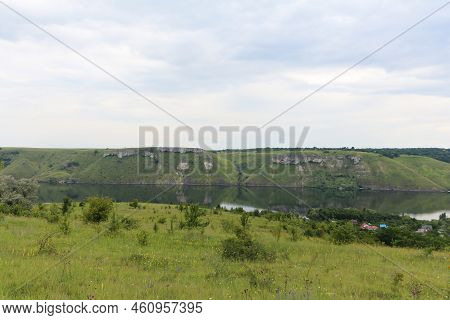 Dniester River, Ukraine. Landscape On The Banks Of A Large River With Calm Smooth Water. Bakota Bay 