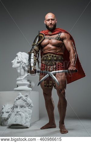 Ancient Roman Warrior With Swords Around Marble Statues
