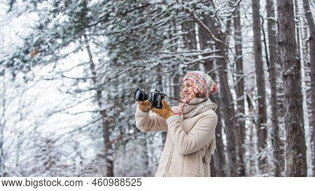 Traveling Concept. Capturing Winter. Take Stunning Winter Photos. Winter Hobby. Woman Photographer P