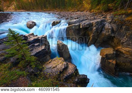 Upper Sunwapta Falls In Autumn, Jasper National Park, Canada. The Water Originates From The Athabasc