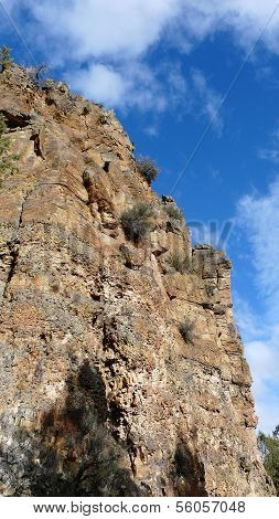 Basalt Cliff under Blue Sky