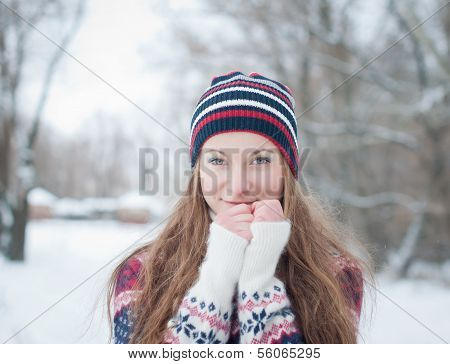 Outdoor fashion portrait of pretty young girl in winter. Winter girl.
