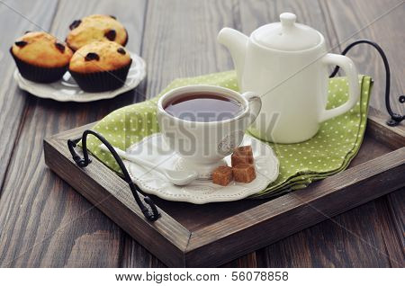 Tasse Tee und Teekanne