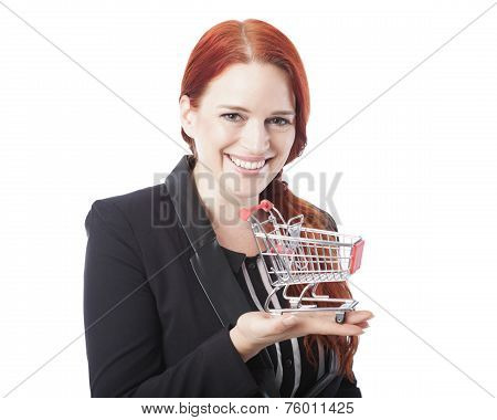 Young Redhead Woman Holding A Shopping Cart
