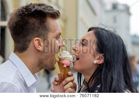 a young couple with a bag of ice. ice cream cones as a refreshment in summer