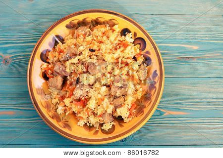 pilaf with meat and carrot, traditional oriental rice