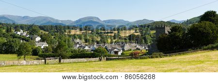 Hawkshead Lake District Cumbria UK beautful English village in summer with blue sky panorama