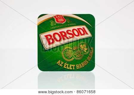 Borsodi Beermat On A Glass Plate.
