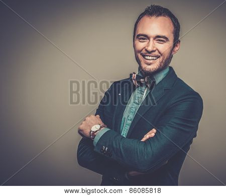 Sharp dressed fashionist wearing jacket and bow tie