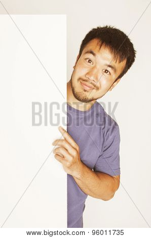 pretty cool asian man holding empty white plate smiling