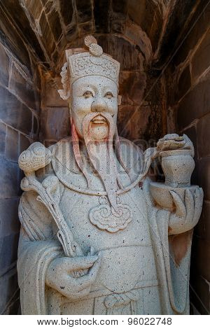 Guardian Statue at Wat Arun - the Temple of Dawn in Bangkok, Thailand