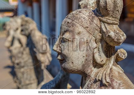 Guardian Statue at Wat Arun - the Temple of Dawn in Bangkok, Thailand