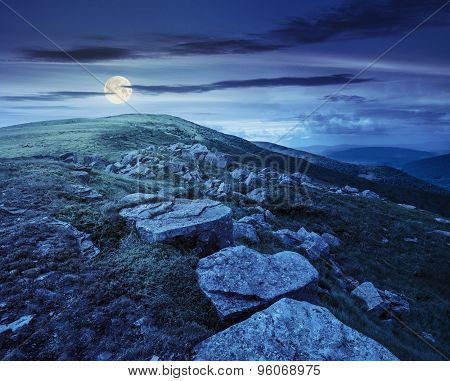 White Boulders On The Hillside At Night