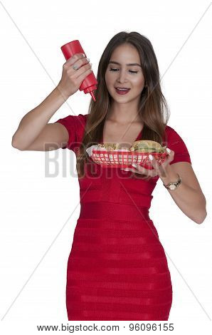 Woman Squeezing Catsup