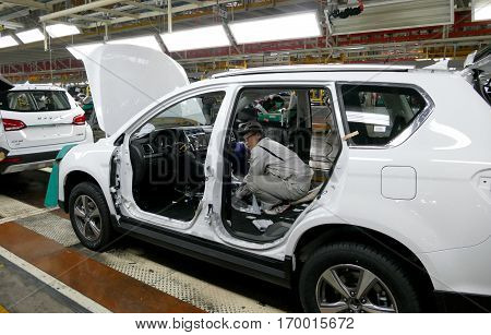Tianjin, China. December 17Th 2016: Workers Assemble A Car On Assembly Line In Car Factory