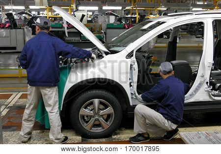 Tianjin, China. December 17Th 2016: Workers Assemble A Car On Assembly Line In Car Factory