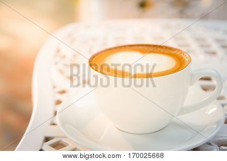 coffee cup and latte art in holiday